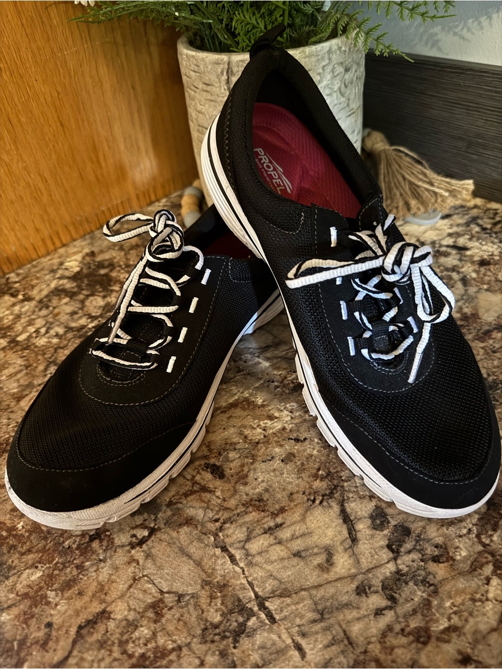 Women’s Black Slip-On Sneakers with White Accents